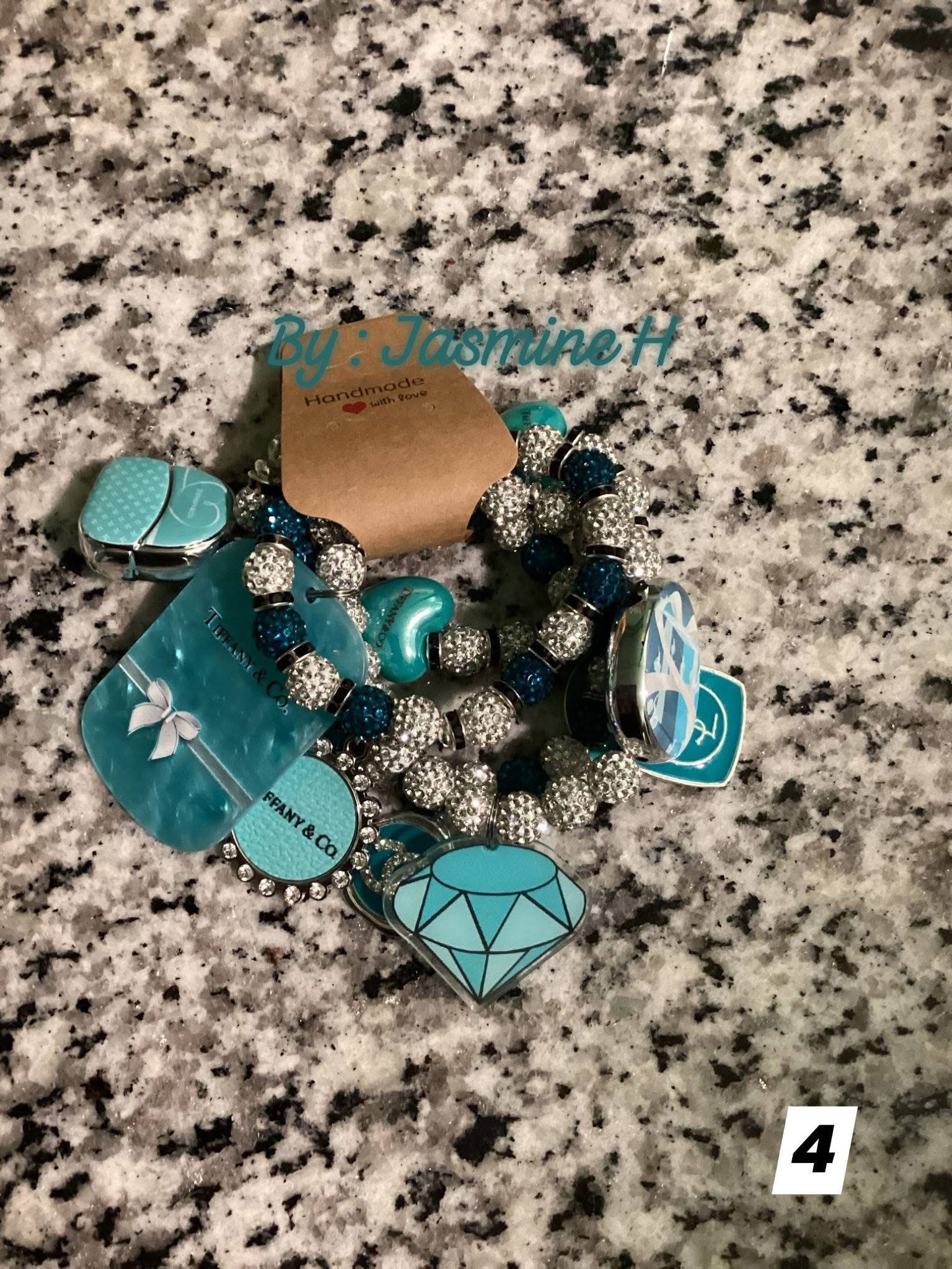 Teal and silver chunky bling bracelets with sparkling beads and decorative charms